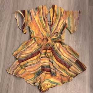 Luxxel Multicolored Romper with open back.